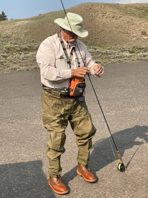 man with fishing rod